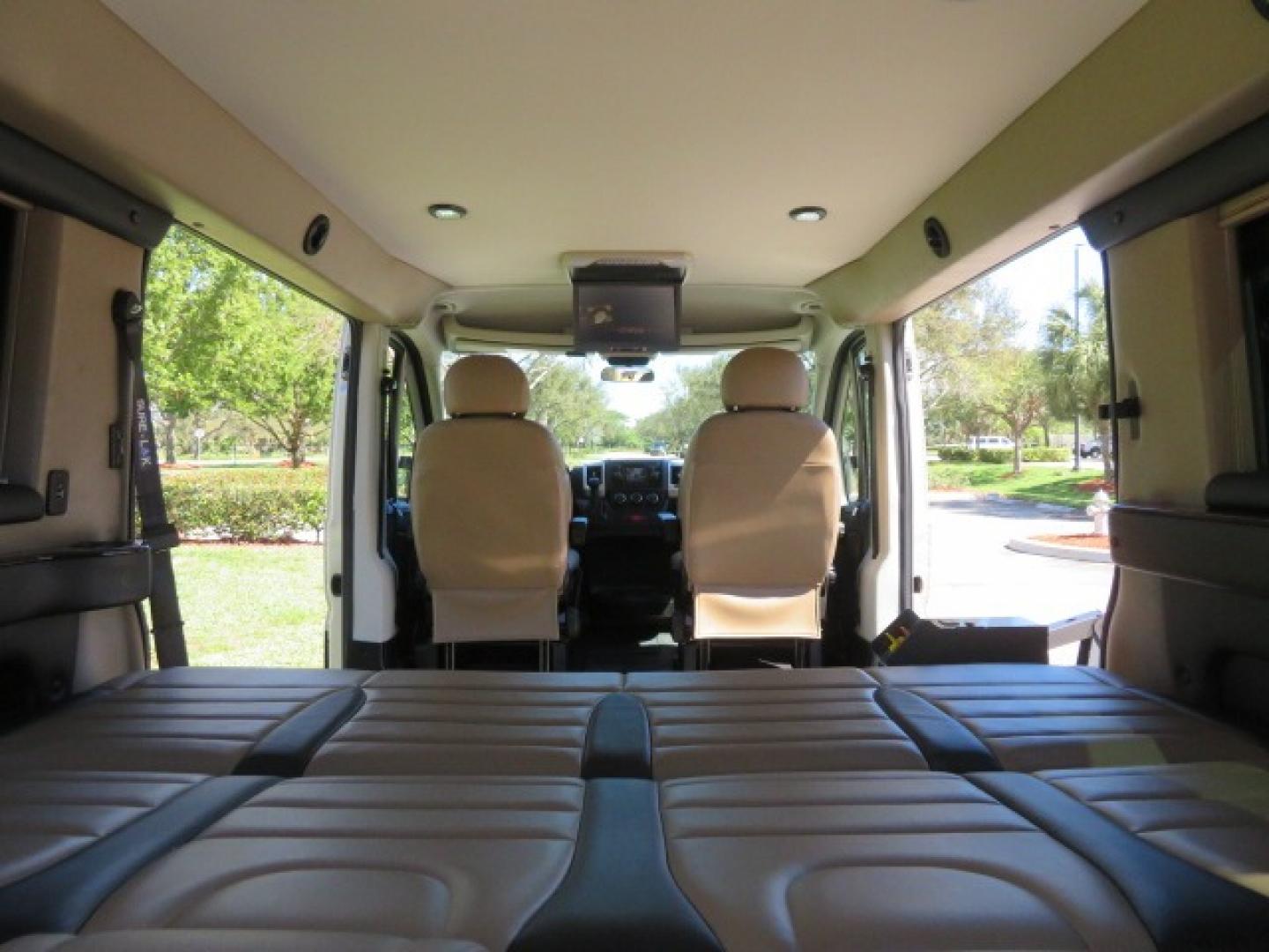 2016 Gold /Tan and Black Leather RAM Promaster (3C6TRVAG5GE) , located at 4301 Oak Circle #19, Boca Raton, FL, 33431, (954) 561-2499, 26.388861, -80.084038 - You are looking at a Gorgeous 2016 Ram Promaster Tempest X Handicap Wheelchair Conversion Van with 30K Original Miles, Lowered Floor, Dual Side Entry Doors, Power Passenger Side Entry Door, 750lb Braunability Wheelchair Lift, 4 Passenger Rear Power Bench Seat/Bed, Navigation, Rear Entertainment, Sur - Photo#71